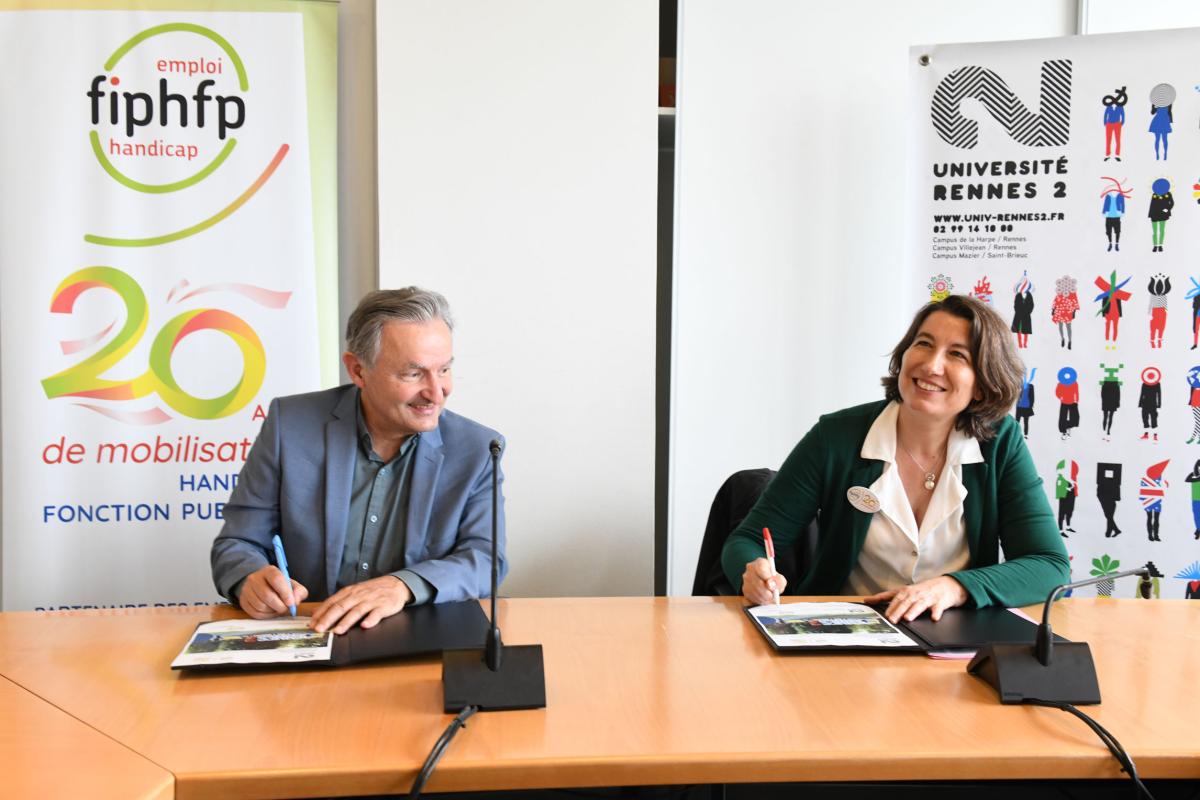 Photographie des deux signataires de la convention