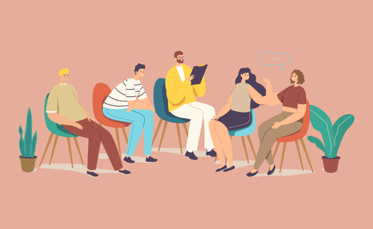 Groupe de personnes assises en arc de cercle et réfléchissant ensemble